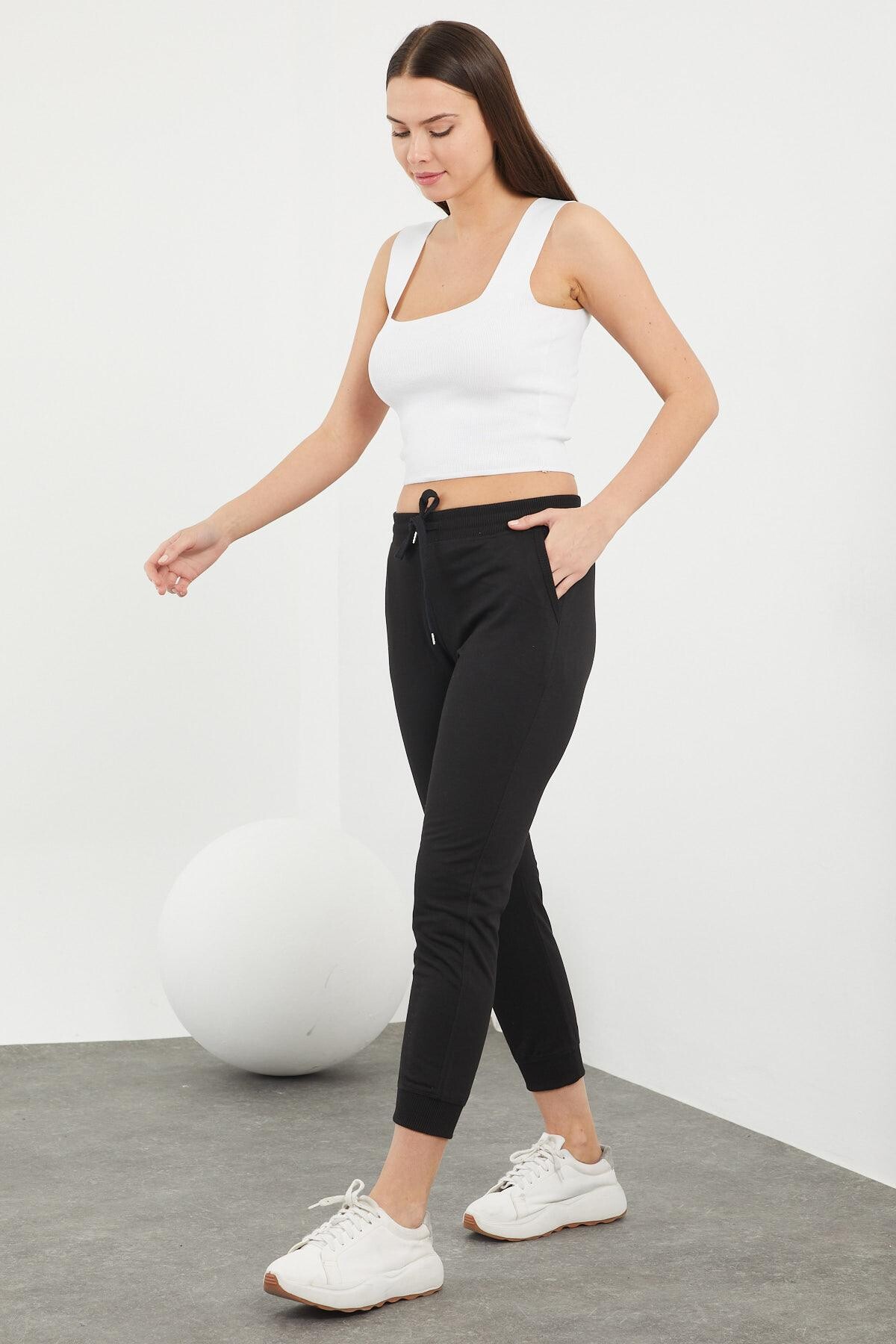 Beli ve Paçaları Lastikli Cepli Karyokalı Alt Eşofman