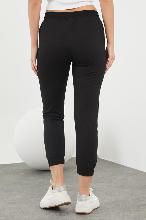 Beli ve Paçaları Lastikli Cepli Karyokalı Alt Eşofman