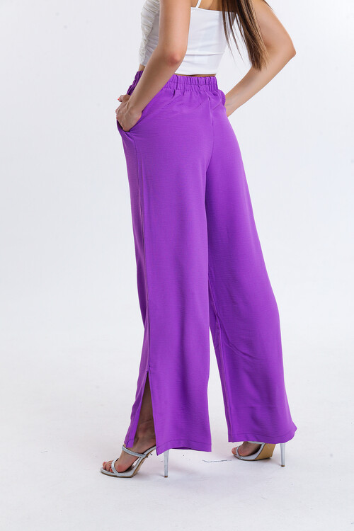 Paçaları Yırtmaçlı Beli Lastikli Cepli Yüksek Bel Bol Paça Pantolon